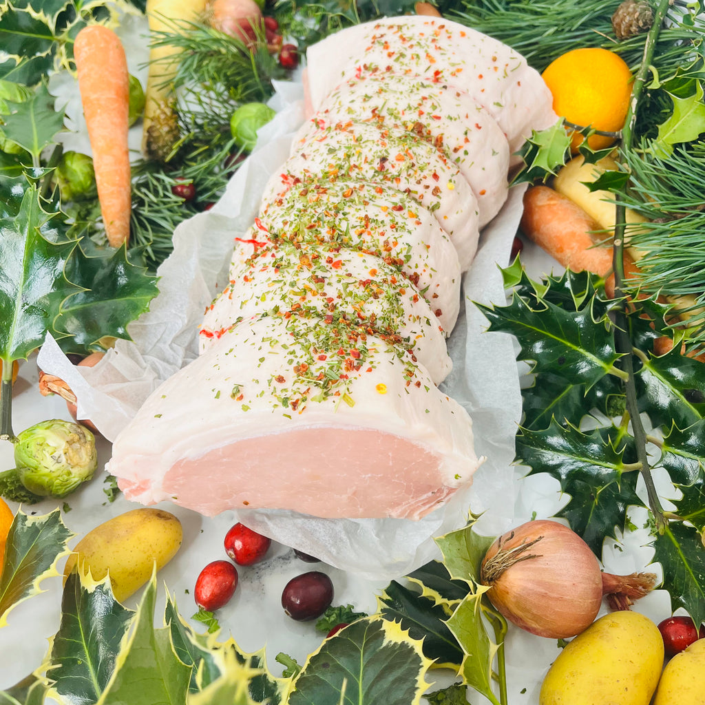 Pork Loin Joint with spices and vegetables around