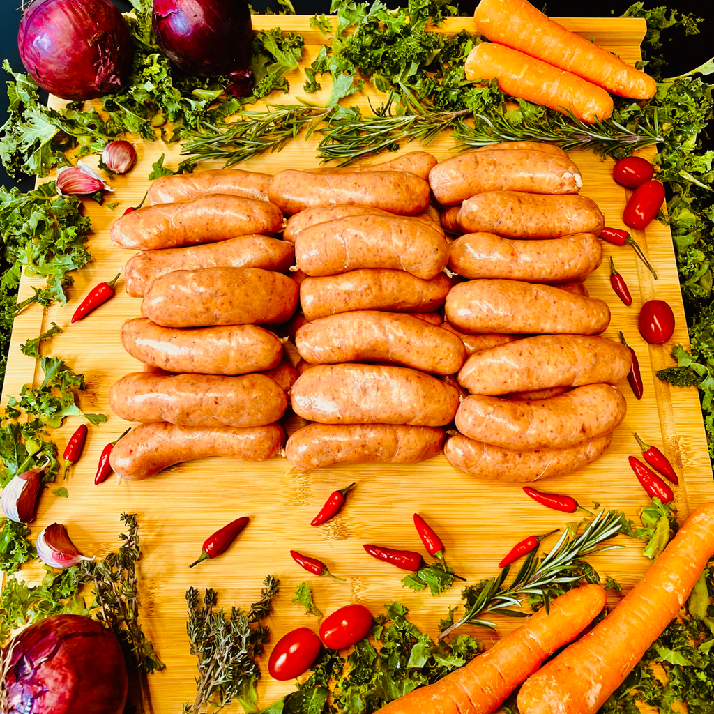 Pork and Chilli sausages, spices and vegetables